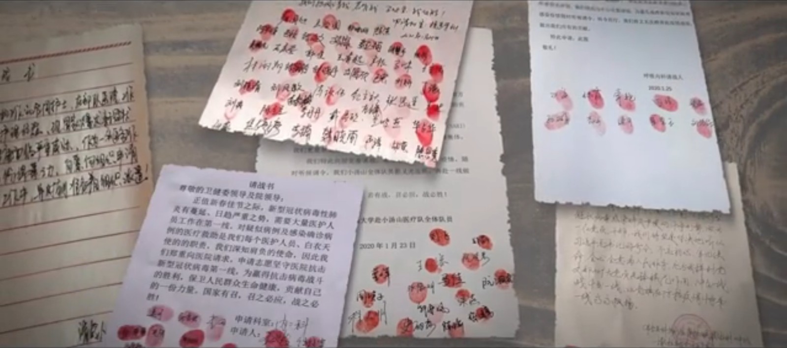 【抗疫评论】红手印里的家国情