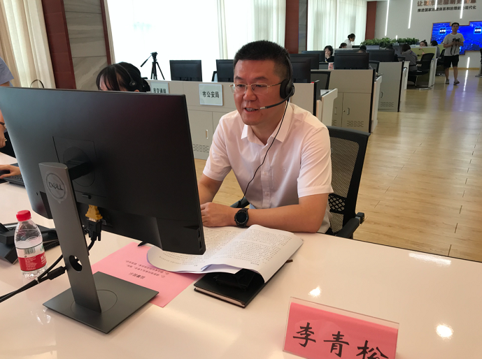 卢先清)"你好,我是市市场监督管理局局长李青松,请讲……",7月14日